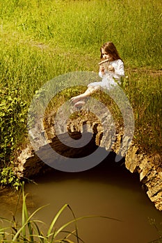 Little girl with flute