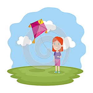 Little girl flying kite in the field