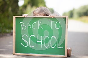 Little girl frightened and unhappy back to school