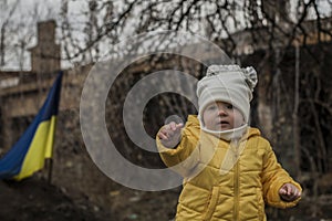 Little girl in front of defensive structures.