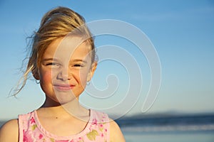 Little girl with funny expression photo