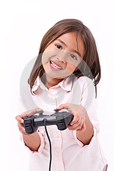 Little girl gamer playing video game