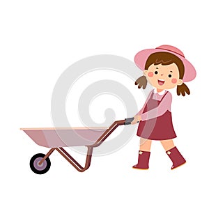 Little girl gardener pushing empty wheelbarrow