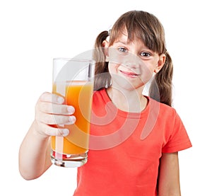 Little girl with a glass of fresh juice