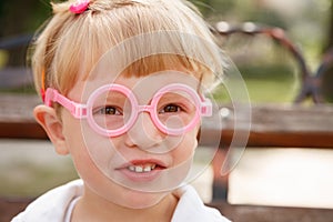 Little girl in glasses
