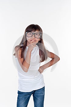 Little girl with glasses thinking