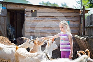 Little girl with goat