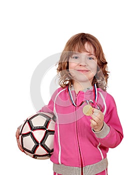 Little girl with golden medal and soccer ball