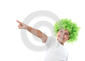 Little girl in green wig looking aside