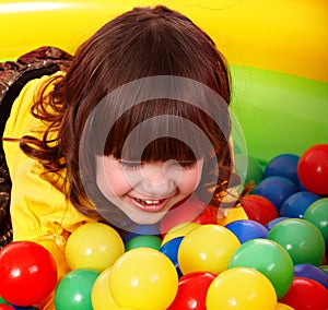 Little girl with group ball.