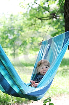 Little girl on a hammock