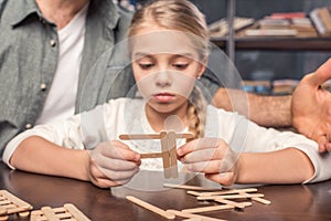 Little girl handcrafting