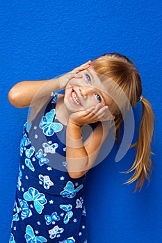 Little Girl Hands on Face Head Tilted