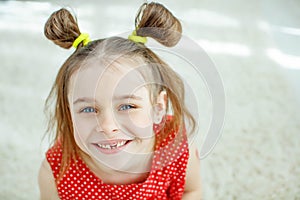 Little girl has no tooth. the child has lost a baby tooth.