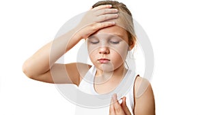 Little girl have a cold and high fever, baby touches his forehead and checking body temperature by using thermometer.
