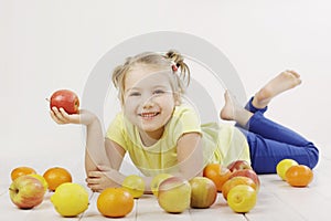 Little girl having an apple