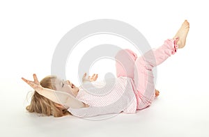 Little girl having fun on the floor