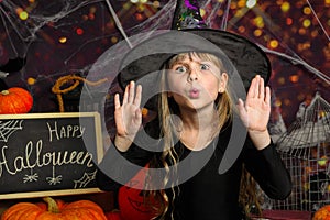 Little girl having fun on Halloween trick or treat