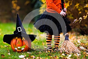 Little girl having fun on Halloween trick or treat