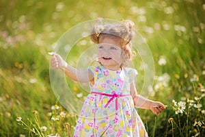 Little girl having fun outdoors.