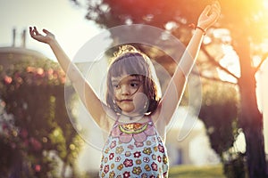 Little girl having fun outdoors