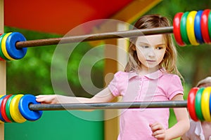 Little girl having fun at a playground