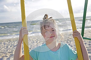 Little girl having fun on the swing