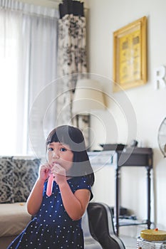 Little girl having an local made ice cream