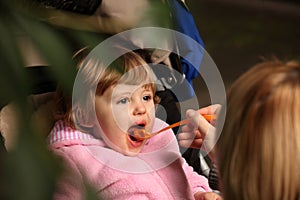 Little girl having lunch