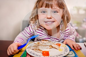 Little girl having lunch