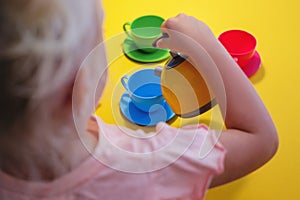 Little girl having a tea party