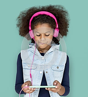 Little Girl Headphones Using Phone