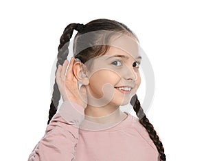 Little girl with hearing aid