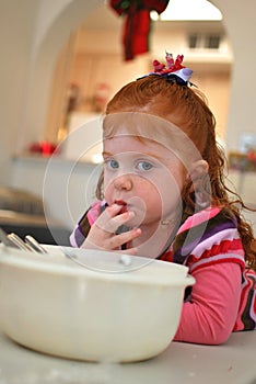 Little Girl Helps Bake