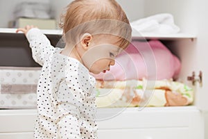 Little girl in her children`s room