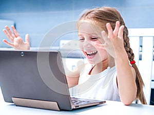 Little girl with her computer