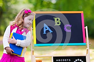 Little girl on her first school day