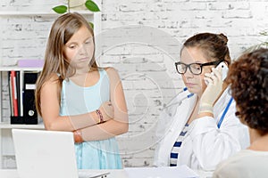 A little girl and her mother to the doctor,