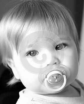 Little Girl and her pacifier in black and white