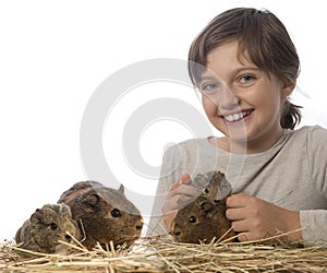 Little girl and her pet a guinea pigs