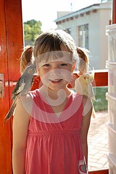 Little girl with her pets