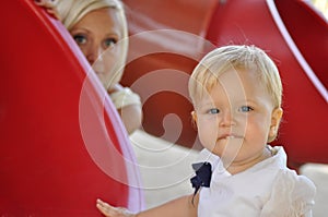 Little girl with here mother in park