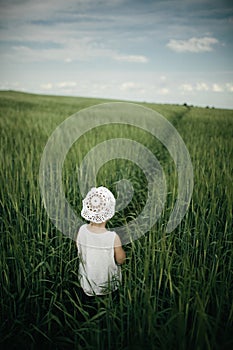 Little girl in high grass