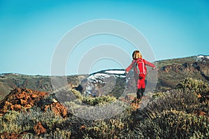 Little girl hiking in mountains, family travel