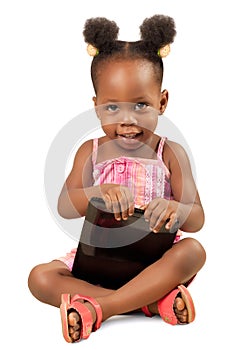 Little girl holding a digital tablet