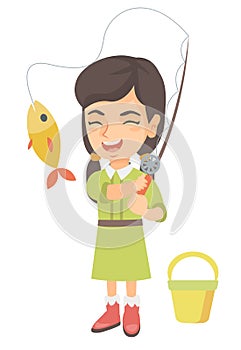 Little girl holding fishing rod with fish on hook.