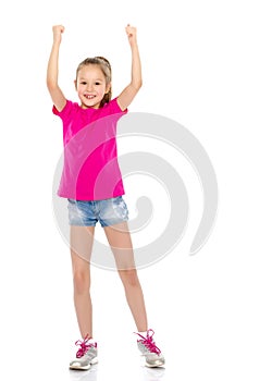 Little girl holding her thumb up