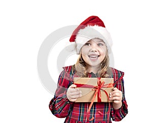 Little girl holding present box isolated on white. Child in christmas hat,costume with gift in hands