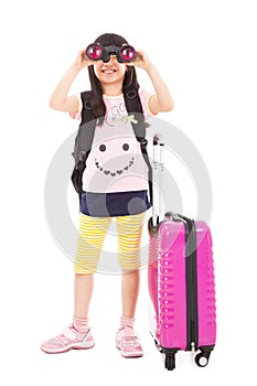 Little girl holding telescope and travel suitcase