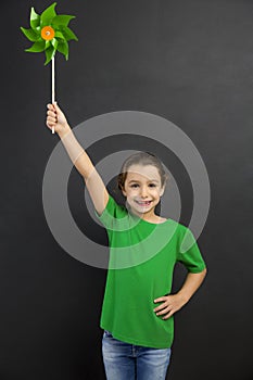 Little girl holding a windmill